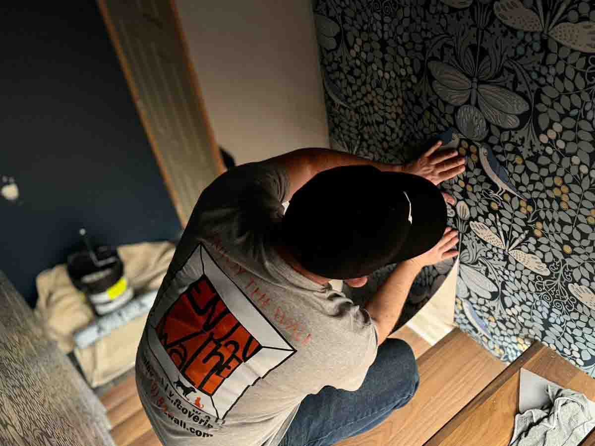 professional wallpaper installation Denver metro area vinyl wallcovering installer working detail